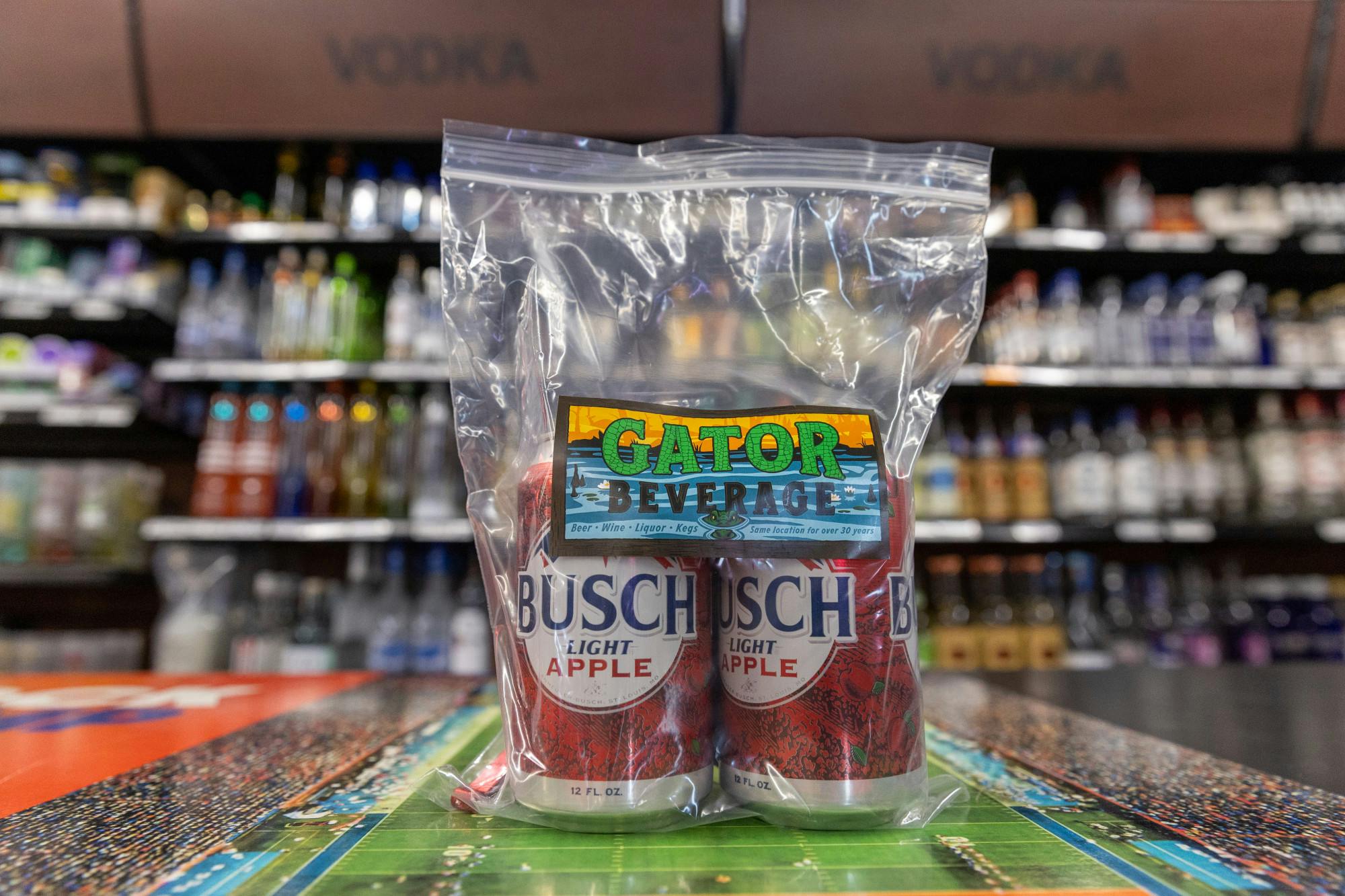 Two Busch Light Apples, affectionately known as "Bapples," sit on a counter at Gator Beverage on Thursday, Aug. 29, 2025. The liquor store brought back the cult favorite drink after their last restock in April sold out in 48 hours.