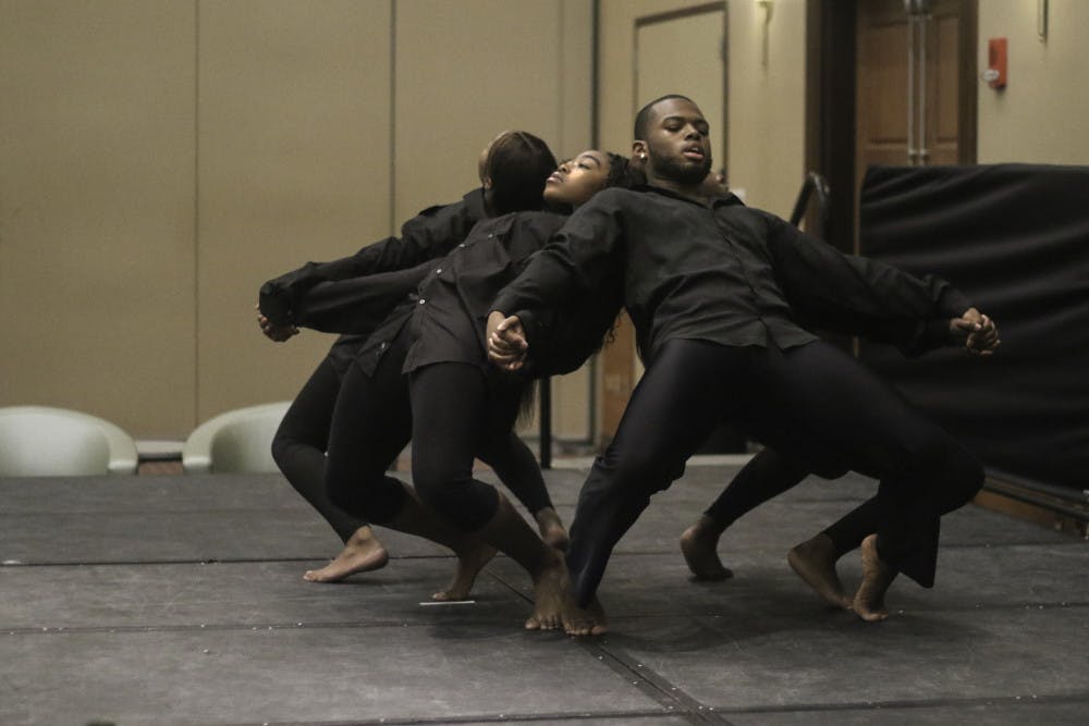 Britney Young, 18, and Diaunte Jenkins, 19, of the group United We Dance, dance to a version of “Strange Fruit” sung by Nina Simone at the Martin Luther King Jr. opening ceremony in the Reitz Union Grand Ballroom Thursday. The guest speaker at the event was Jeraldine Williams, the first African American woman to graduate from the UF’s College of Journalism and Communications. “I look at all of you: black, white, other, and we laid the foundation for you to be where you are, the way you are today.” Chris Day / Alligator Staff
