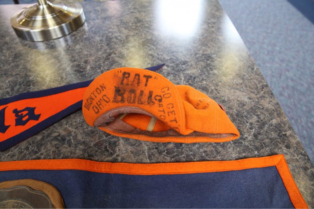The University Archives at the George A. Smathers Libraries received a triangular pennant, a rectangular banner and a “rat cap” from the 1930s as a donation. They are among the oldest items in the university’s collection.&nbsp;