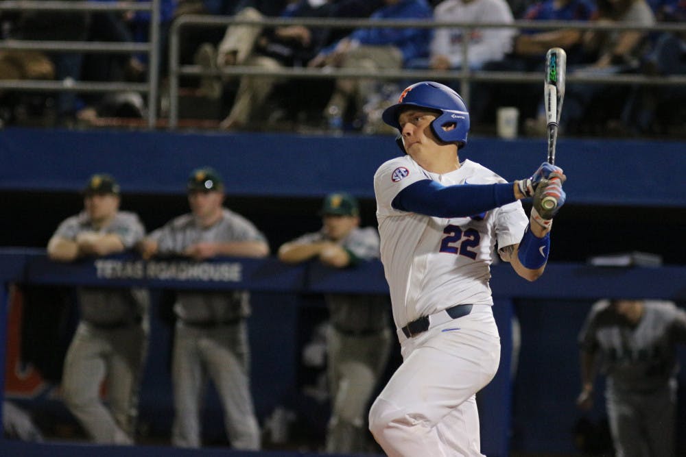 <p>Senior captain JJ Schwarz was one of three Gators batters to homer during the fifth inning of Wednesday's win over North Florida. </p>