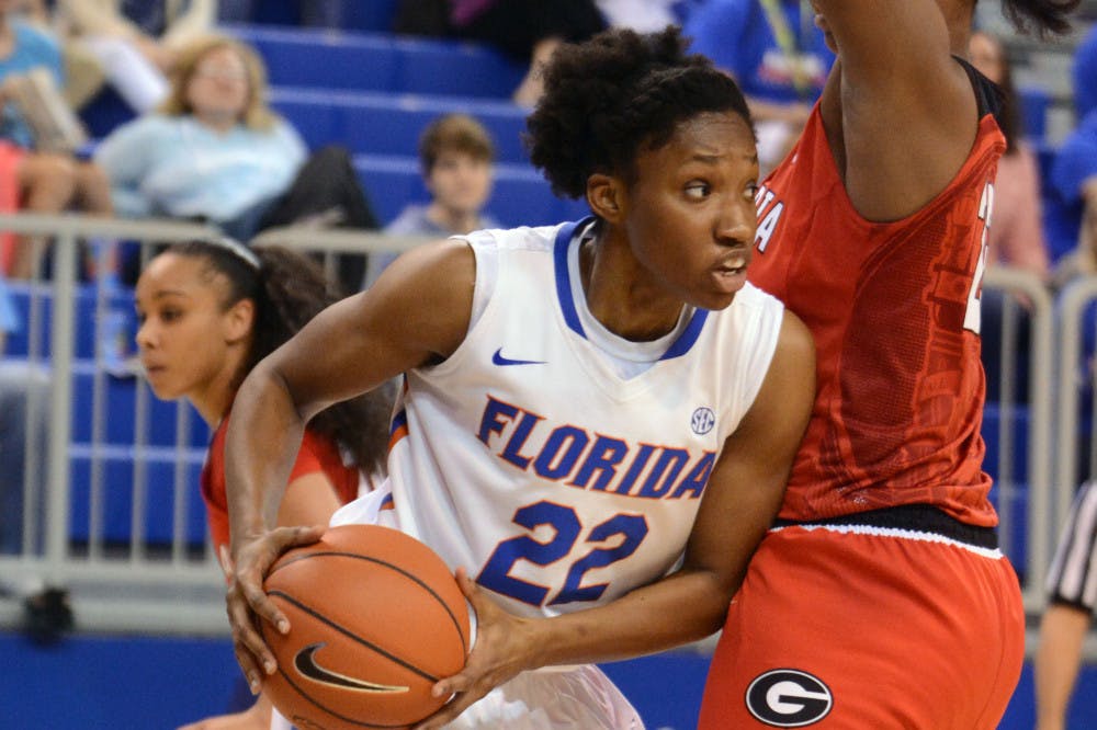 <p>Kayla Lewis drives into the paint during Florida's 52-45 loss to Georgia on Sunday in the O'Connell Center.</p>