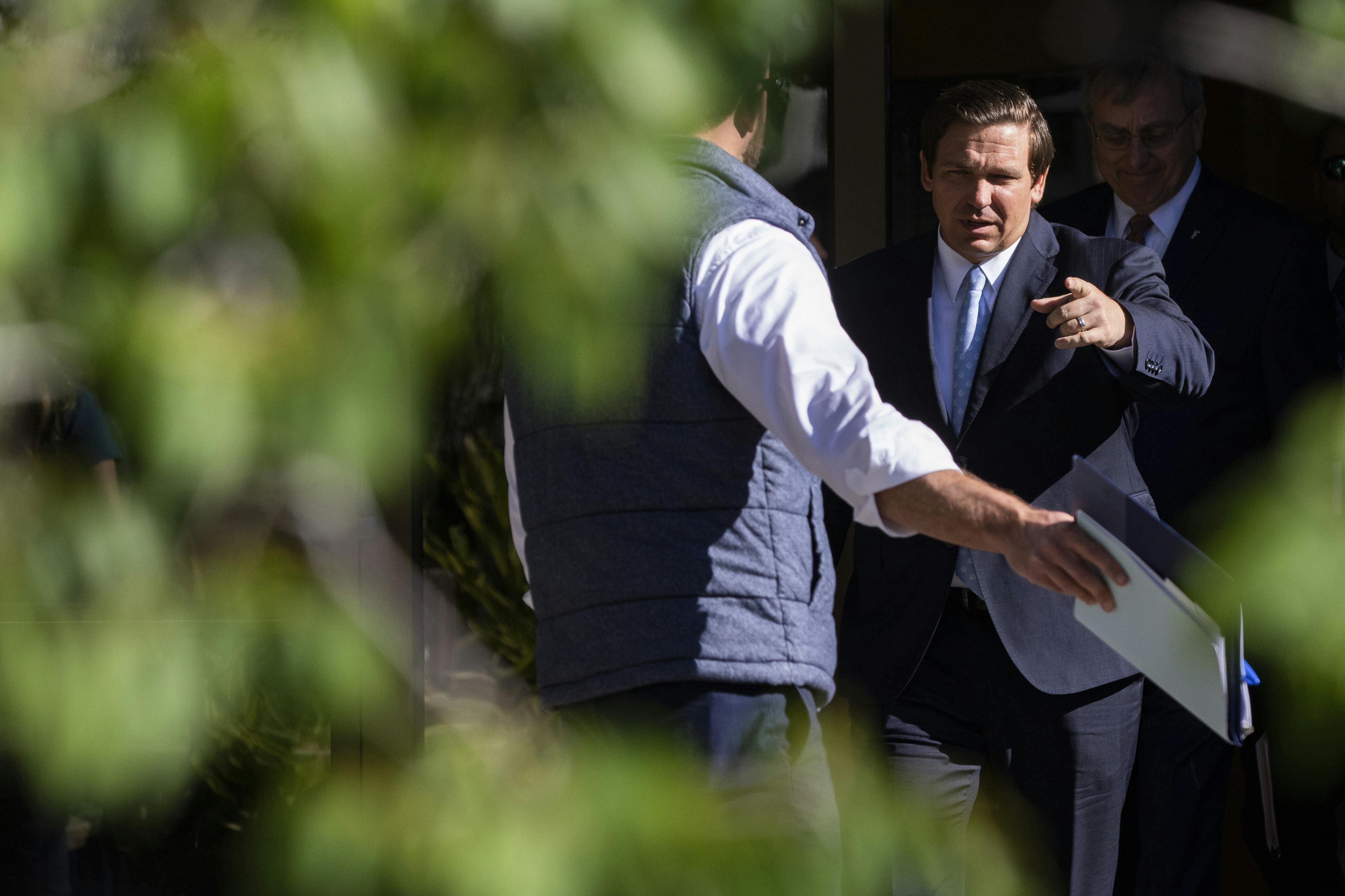 Florida Gov. Ron Desantis speaks about the environment to a crowd of about 50 people April 16 at the Steinmetz Hall courtyard. 
