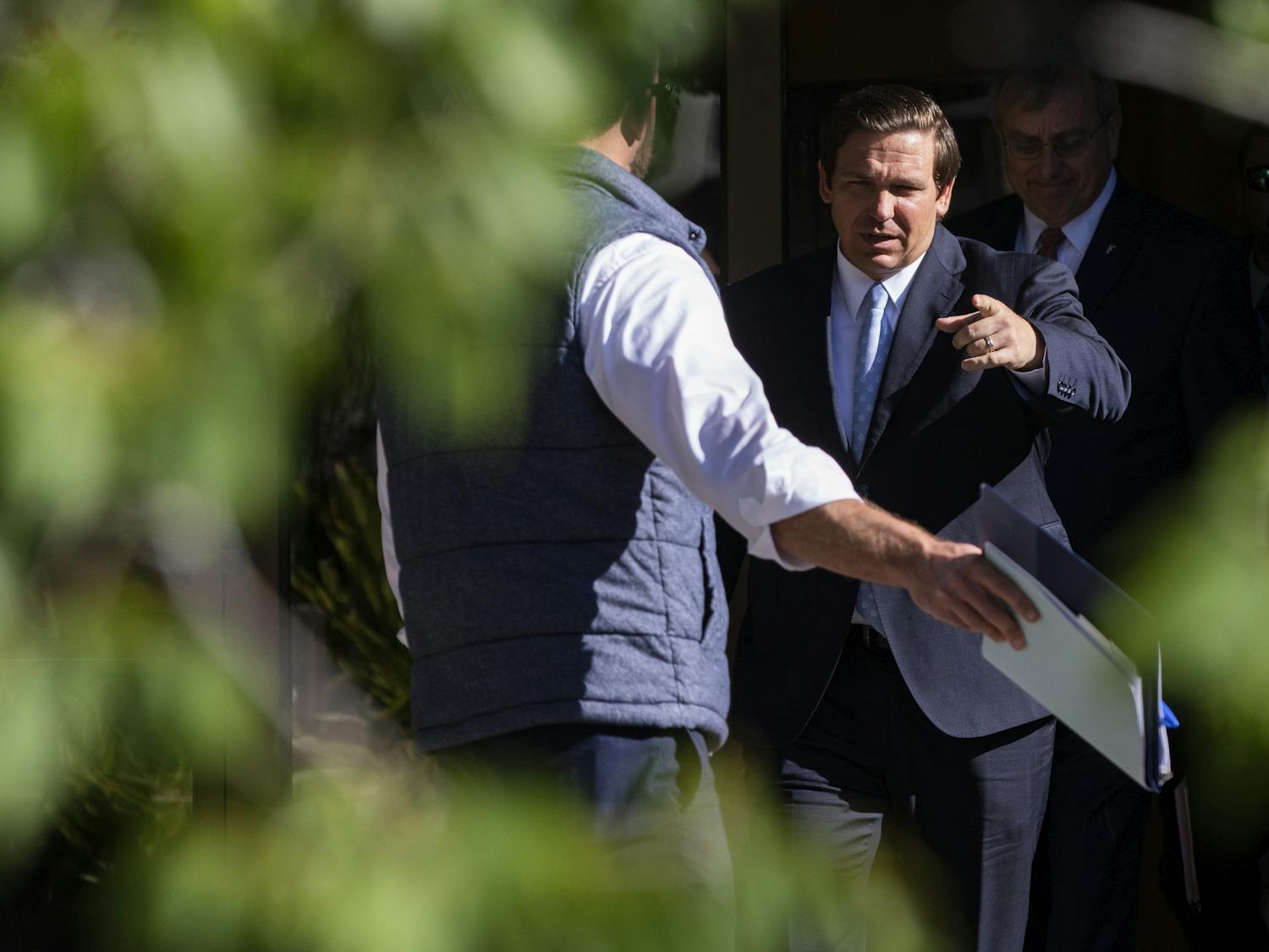 Florida Gov. Ron Desantis speaks about the environment to a crowd of about 50 people April 16 at the Steinmetz Hall courtyard.