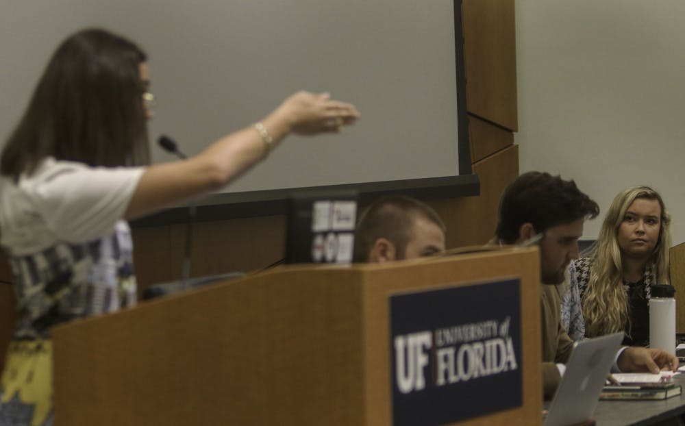 <p><span id="docs-internal-guid-f45957b0-7fff-1b36-a745-88a0fc2f10e0"><span>Libby Shaw (right), senate president for University of Florida student government, receives criticism Tuesday during public comment over the removal of Inspire Senators Ashley Grabowski, the former senate minority leader, and Ben Lima. Eight people read statements from students, alumni and UF staff disagreeing with Shaws actions and asking for the reinstatement of Grabowski and Lima.</span></span></p>
