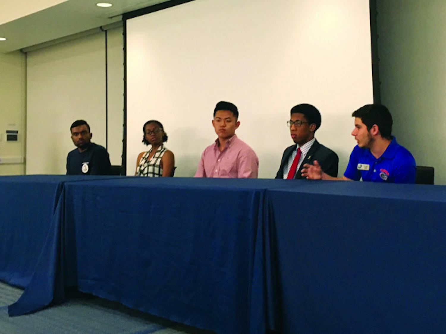 From Left: Analesa Clarke, Ronit Dastidar, Nyasha Joseph, John Kim, Ian Green, Robert Lemus and Alex Chaves discuss mental health in a panel on Tuesday. The event was during the first day of Student Government's annual Mental Health Awareness Week.