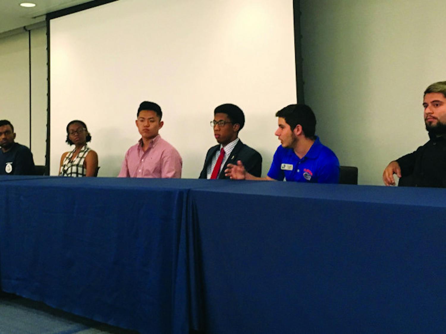 From Left: Analesa Clarke, Ronit Dastidar, Nyasha Joseph, John Kim, Ian Green, Robert Lemus and Alex Chaves discuss mental health in a panel on Tuesday. The event was during the first day of Student Government's annual Mental Health Awareness Week.