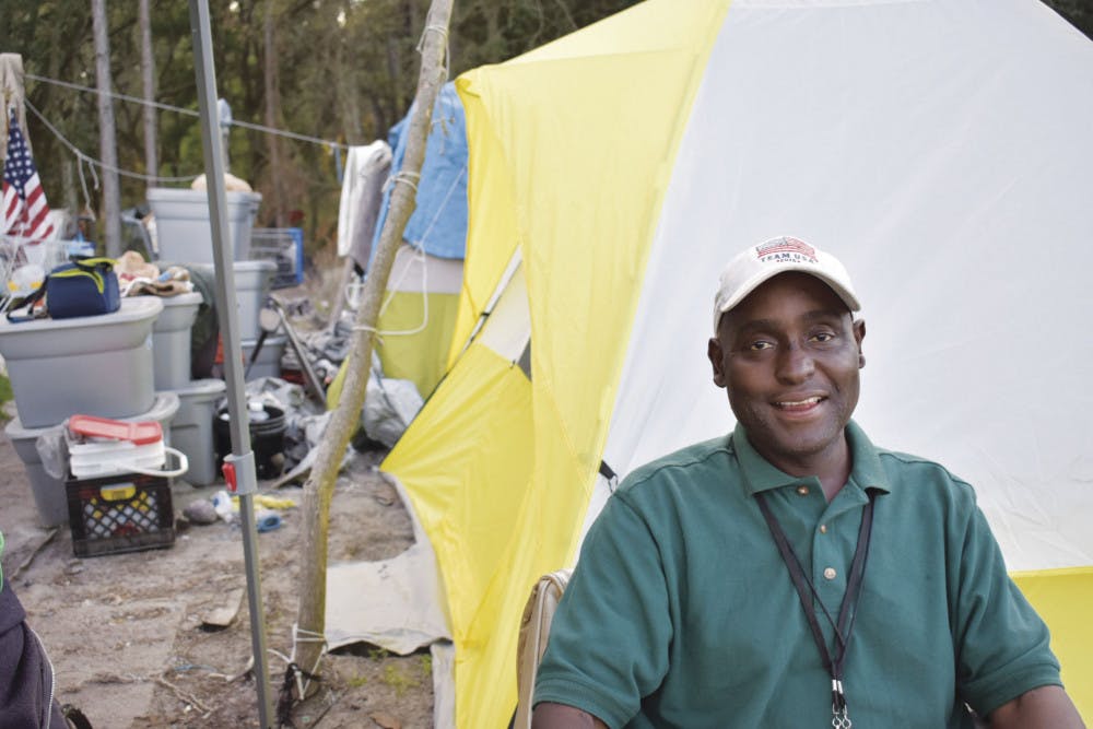 Heard smiles in front of his new tent, donated earlier this month by UF Christian Campus House.
&nbsp;