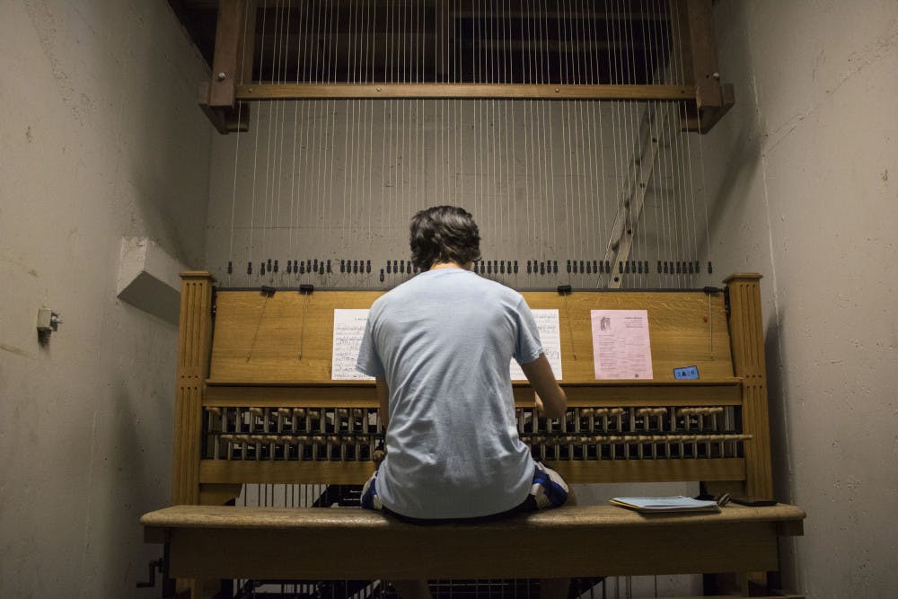 Wade FitzGerald, 22-year-old UF music senior, plays “Milonga” by Ronald Barnes on the carillon in Century Tower. FitzGerald has played the piano since he was five and learned to play the carillon his sophomore year, when he enrolled in the UF Carillon Studio. “You get to learn an instrument,” he said about the studio program, “and you get to brag to people that you play one of the rarest instruments in the world.”