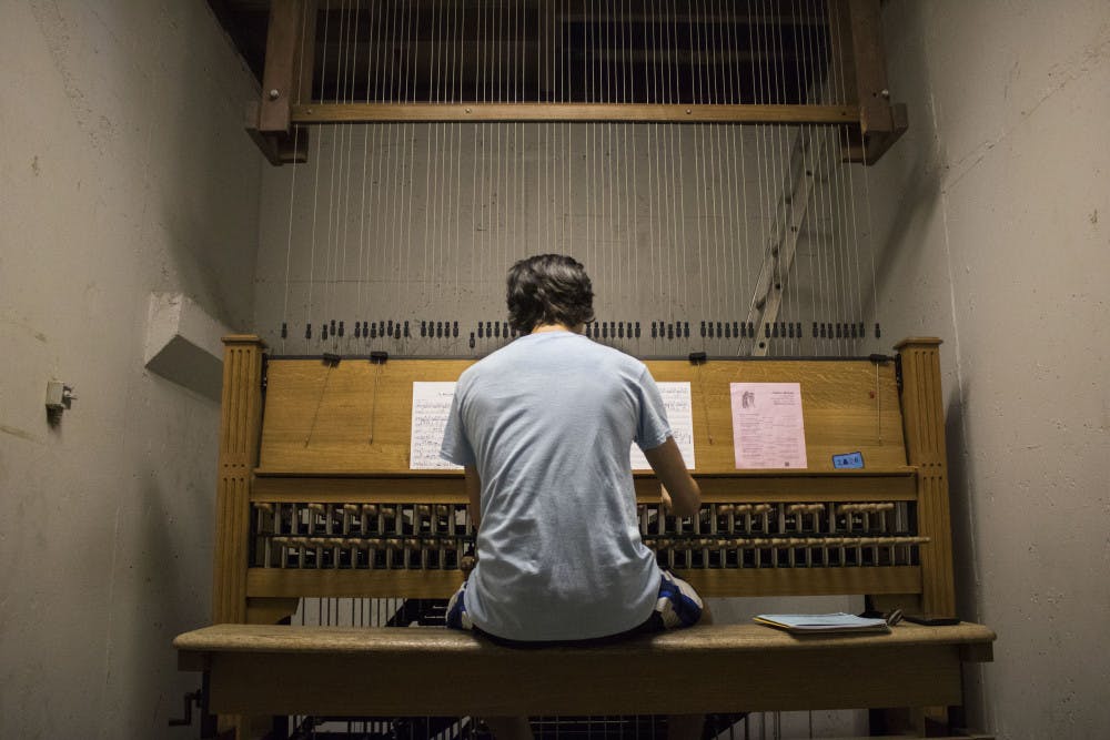<p dir="ltr"><span>Wade FitzGerald, 22-year-old UF music senior, plays “Milonga” by Ronald Barnes on the carillon in Century Tower. FitzGerald has played the piano since he was five and learned to play the carillon his sophomore year, when he enrolled in the UF Carillon Studio. “You get to learn an instrument,” he said about the studio program, “and you get to brag to people that you play one of the rarest instruments in the world.”</span></p>