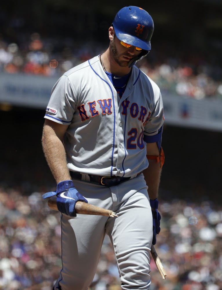 Pete Alonso, one of the few bright spots of this Mets season, looks down in frustration after striking out earlier this month.
