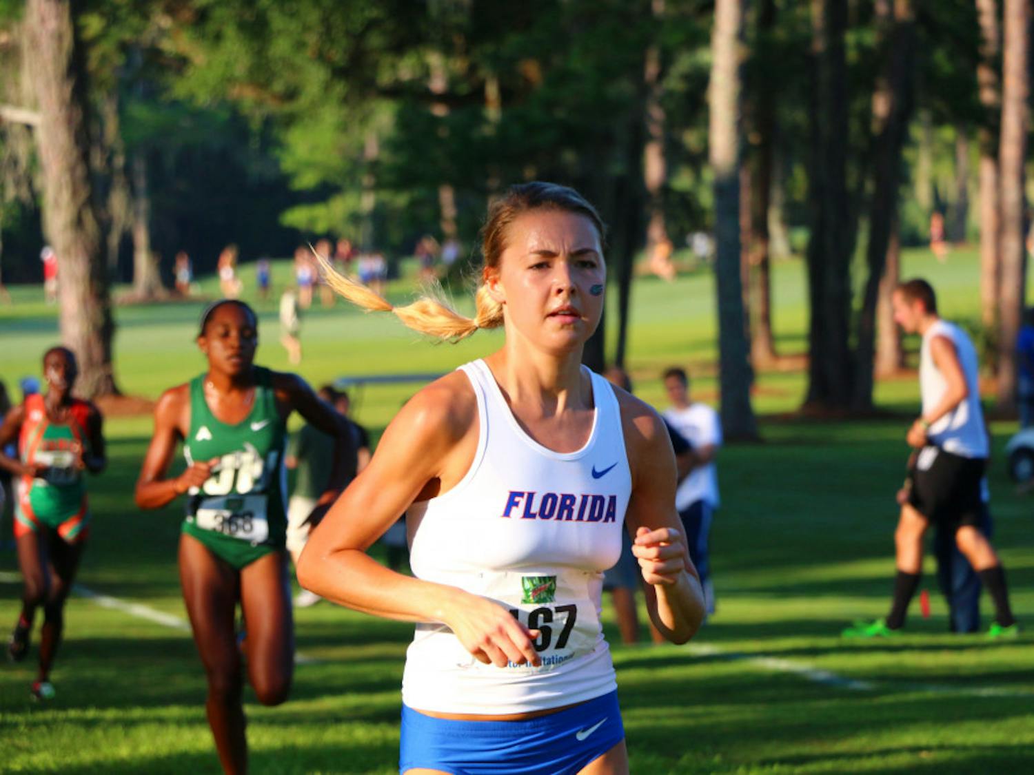 Lauren Perry runs during the 2016 Mountain Dew Gator Invitational — her second race of the season. "I hope people who know me and see what I've gone through will use it as motivation," Perry said. 