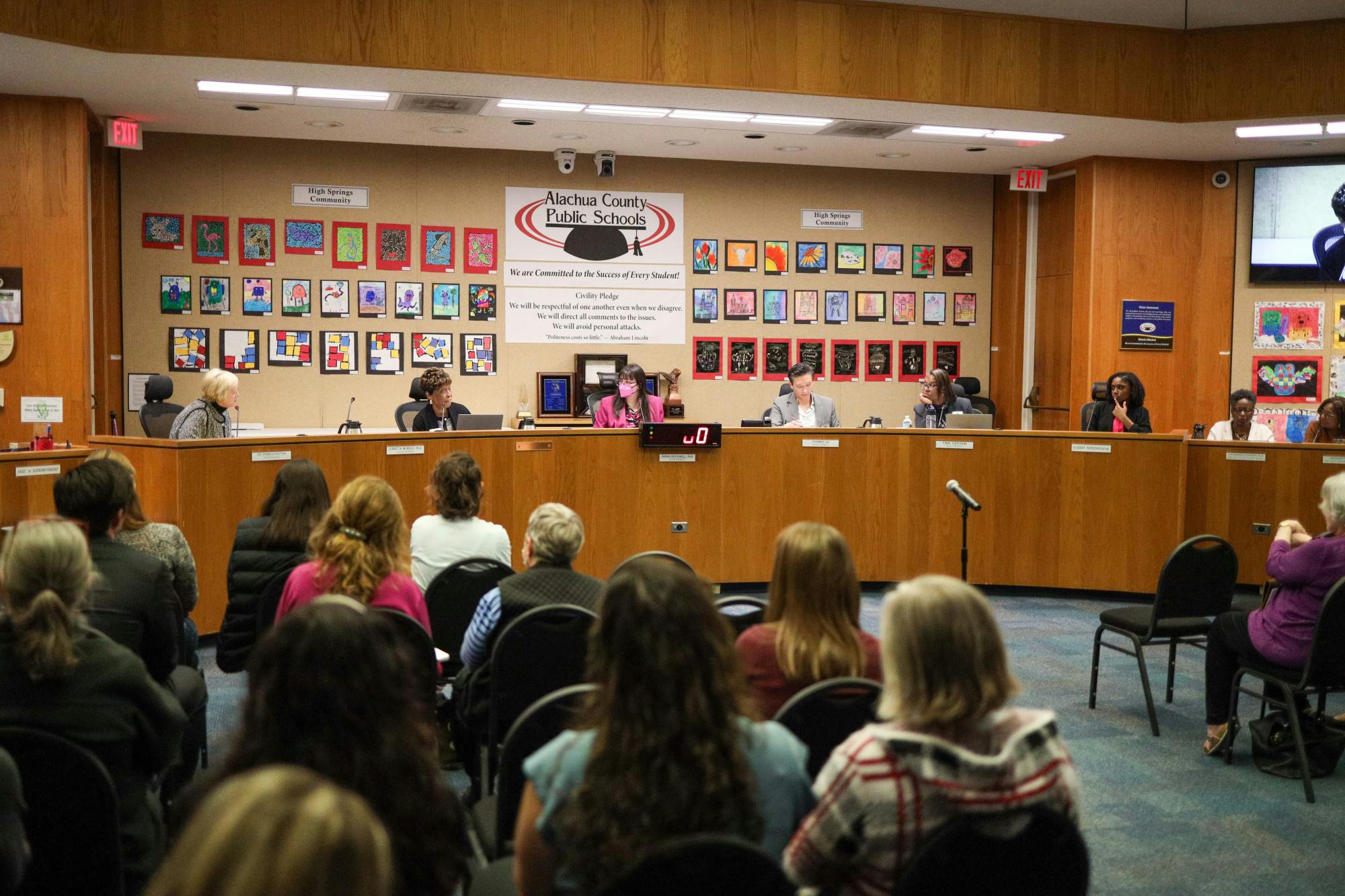 Alachua County Public School Board members convene during a school board meeting on Tuesday, Feb. 18, 2025.