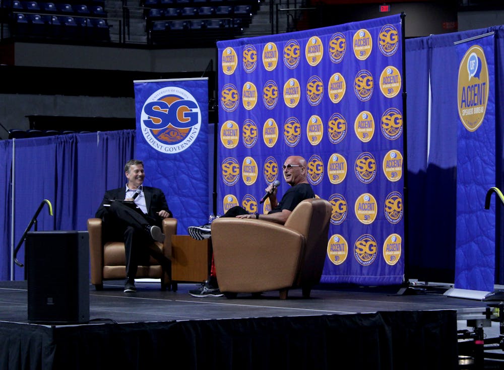 UF journalism department chair Ted Spiker interviews Howie Mandel, a comedian who is known for hosting "Deal or No Deal" and judging "X Factor" at the Stephen C. O'Connell Center on Monday, Feb. 28. 