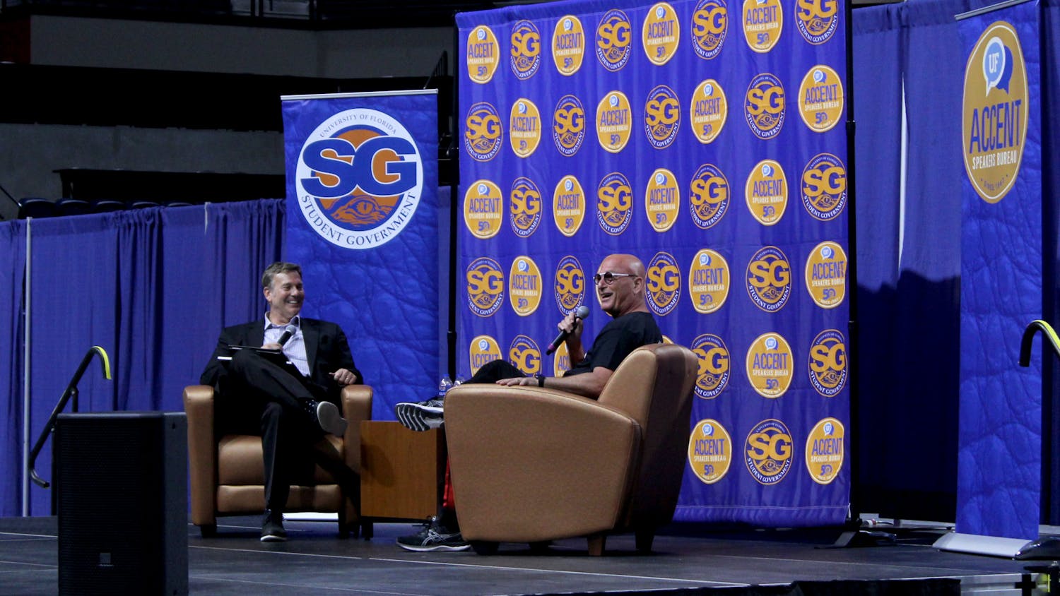 UF journalism department chair Ted Spiker interviews Howie Mandel, a comedian who is known for hosting "Deal or No Deal" and judging "X Factor" at the Stephen C. O'Connell Center on Monday, Feb. 28. 