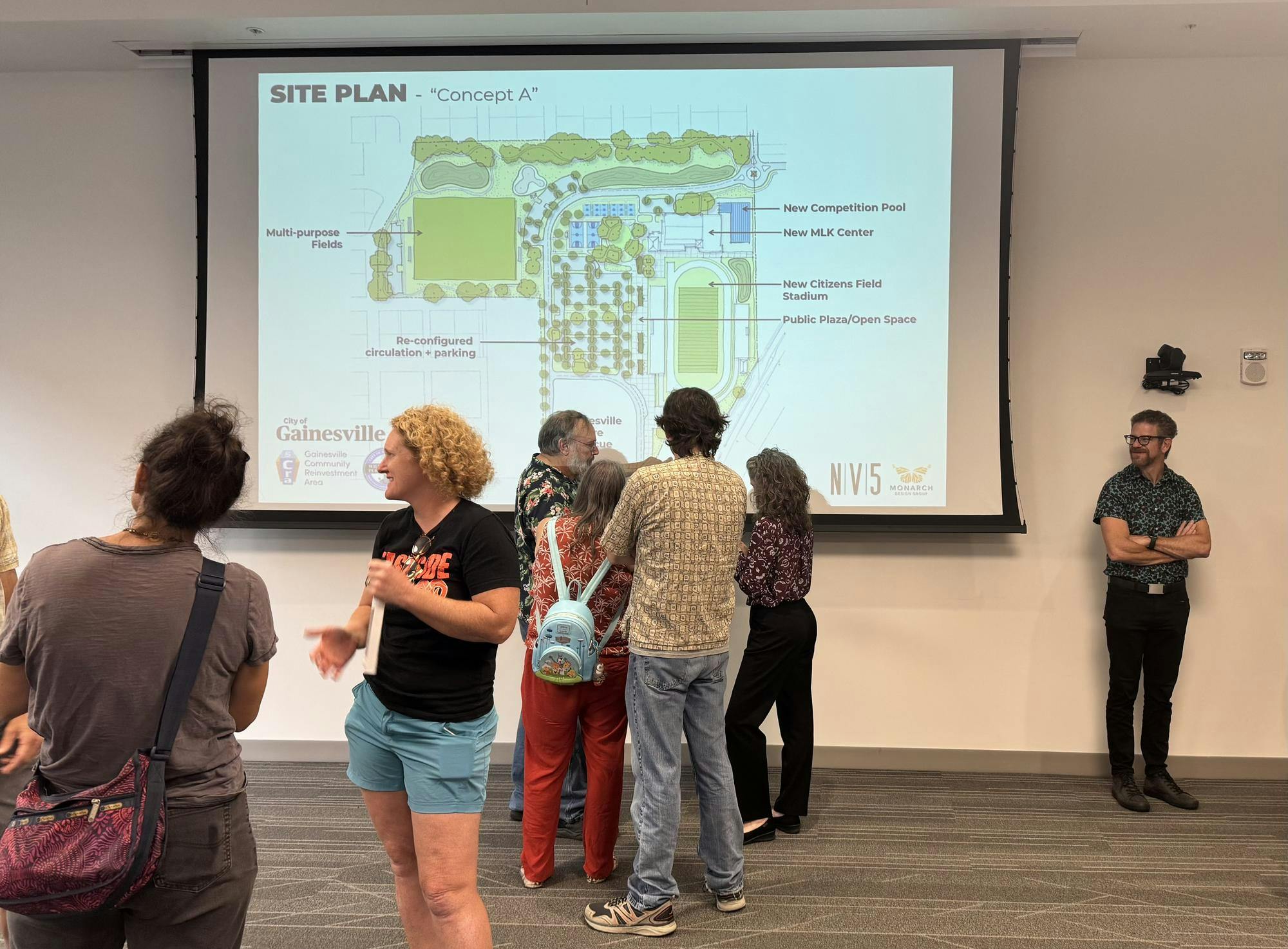 Attendees gather at a public workshop about the Citizens Field Revitalization project on May 29, 2025.