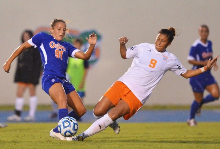 Junior forward Adriana Leon (91) fights for the ball with Tennessee’s Ali Hall (9) during UF’s 2-1 win on Sept. 21 at James G. Pressly Stadium. Despite playing in seven of Florida's 10 games, the junior is second on the team with 21 shots.