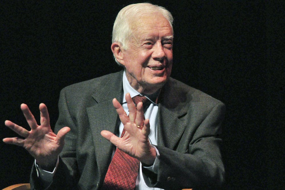 Former President Jimmy Carter speaks at Tuesday’s Accent event at the Phillips Center in place of his wife Rosalynn, who could not attend because she was ill. Carter discussed mental health issues with Dr. Nancy Hardt, answered Twitter questions and read lines from his wife’s mental health speech. “She dreams of a day when stigma is gone,” he said.