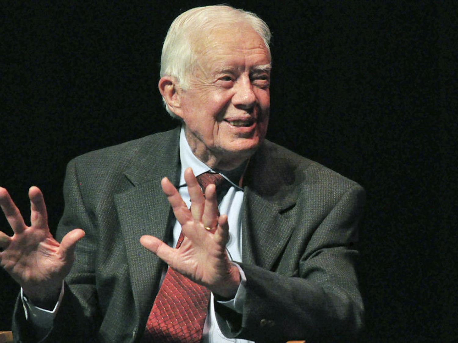Former President Jimmy Carter speaks at Tuesday’s Accent event at the Phillips Center in place of his wife Rosalynn, who could not attend because she was ill. Carter discussed mental health issues with Dr. Nancy Hardt, answered Twitter questions and read lines from his wife’s mental health speech. “She dreams of a day when stigma is gone,” he said.