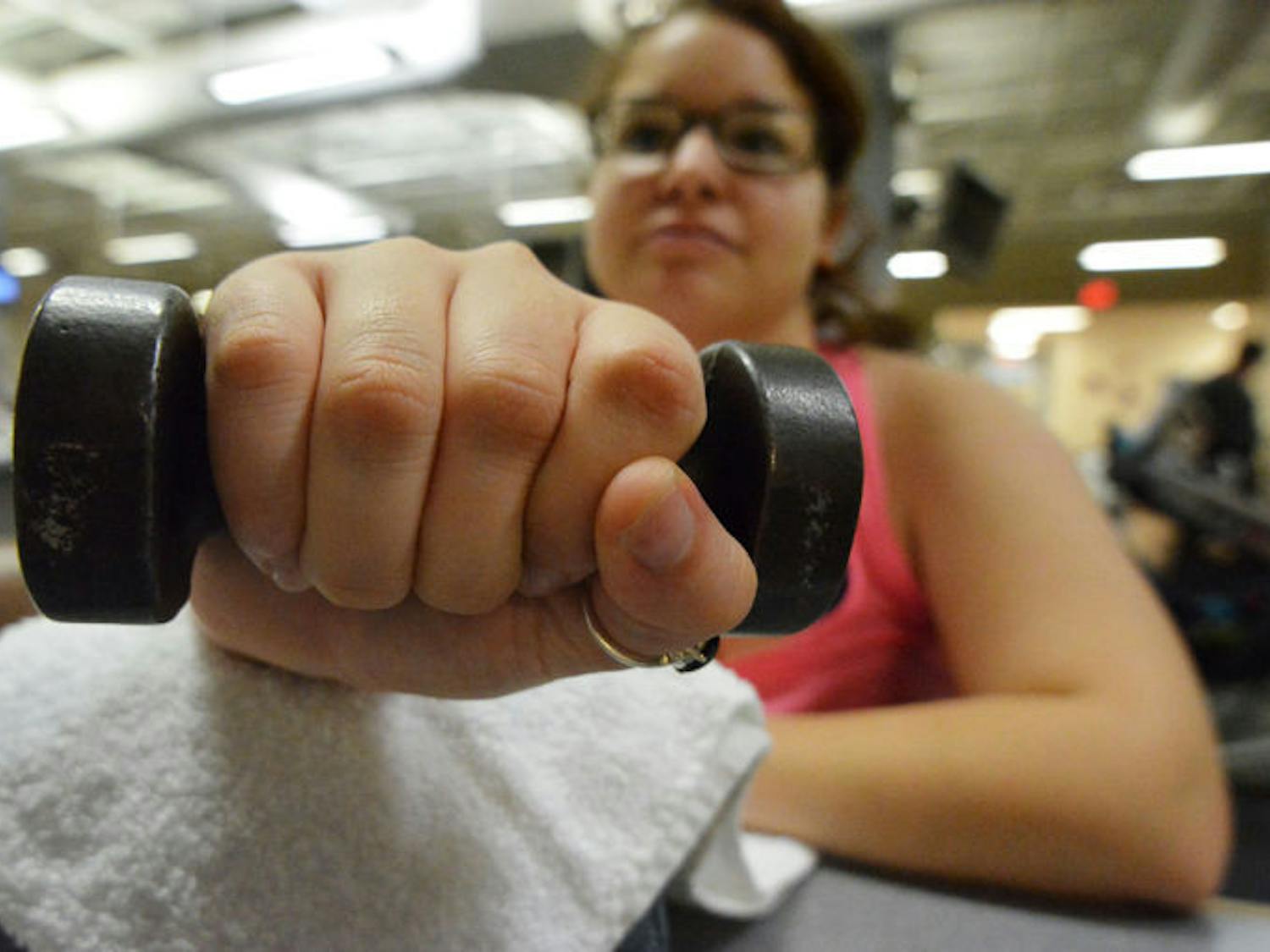 Selvester holds a dumbbell at Magnolia Parke to help with her arthritis. She suffers chronic pain from her arthritis. &nbsp;&nbsp;