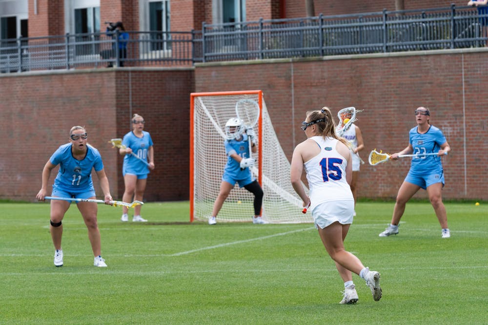 <p>Florida midfielder Josie Hahn (15) looks for an open teammate during the Gators’ game against Old Dominion on March 23, 2024.</p>