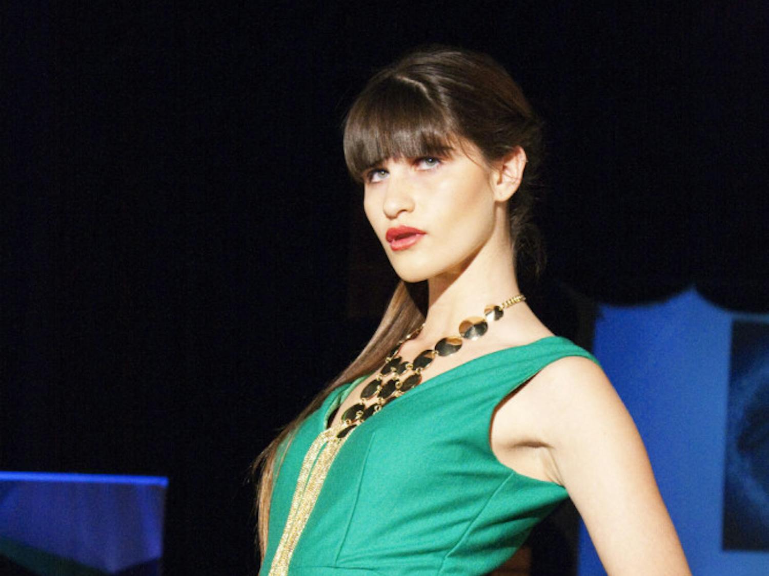A model strikes a pose during the runway shows on Saturday night as part of Gainesville Fashion Week.