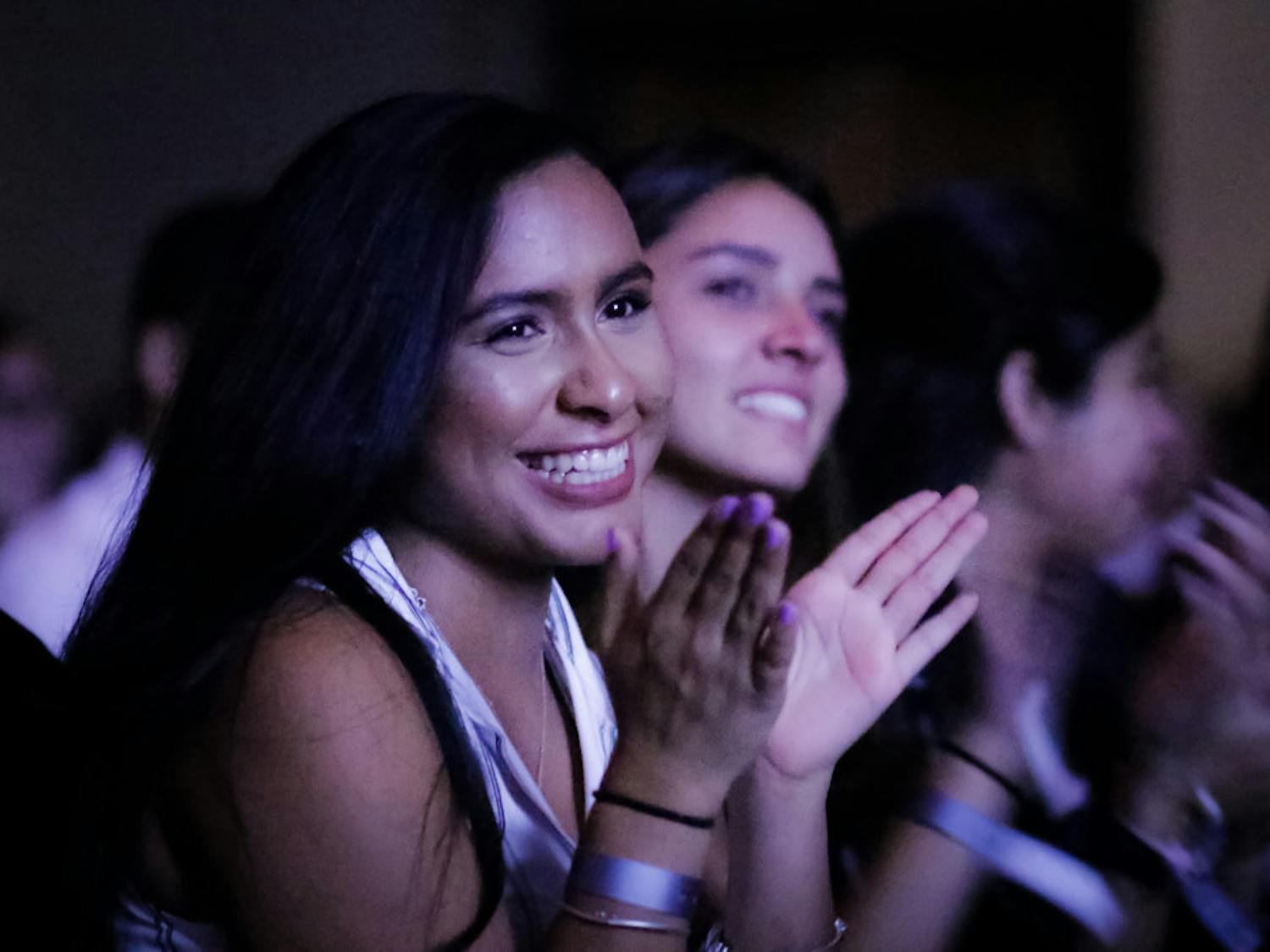 Alexia Yau, a 19-year-old UF natural resource conservation junior, cheers as Julissa Calderon, a Buzzfeed video producer and the keynote speaker at the UF Hispanic-Latinx Student Assembly, concludes her presentation.