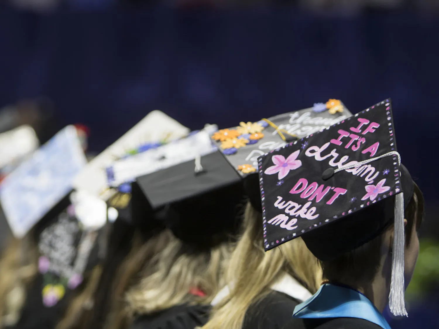 Leah Paxton waits alongside her fellow graduates Saturday morning during the class of 2019 commencement ceremony at the Stephen C. O’Connell Center. About 200 graduates attended for the College of Liberal Arts and Sciences ceremony, which was held two weeks after the original commencement at Ben Hill Griffin Stadium was cancelled due to poor weather conditions.