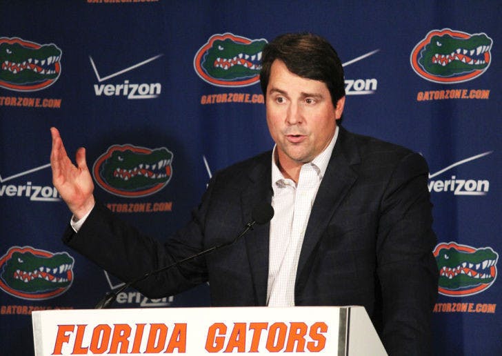 Florida coach Will Muschamp speaks with reporters during his National Signing Day press conference on Wednesday at Ben Hill Griffin Stadium.