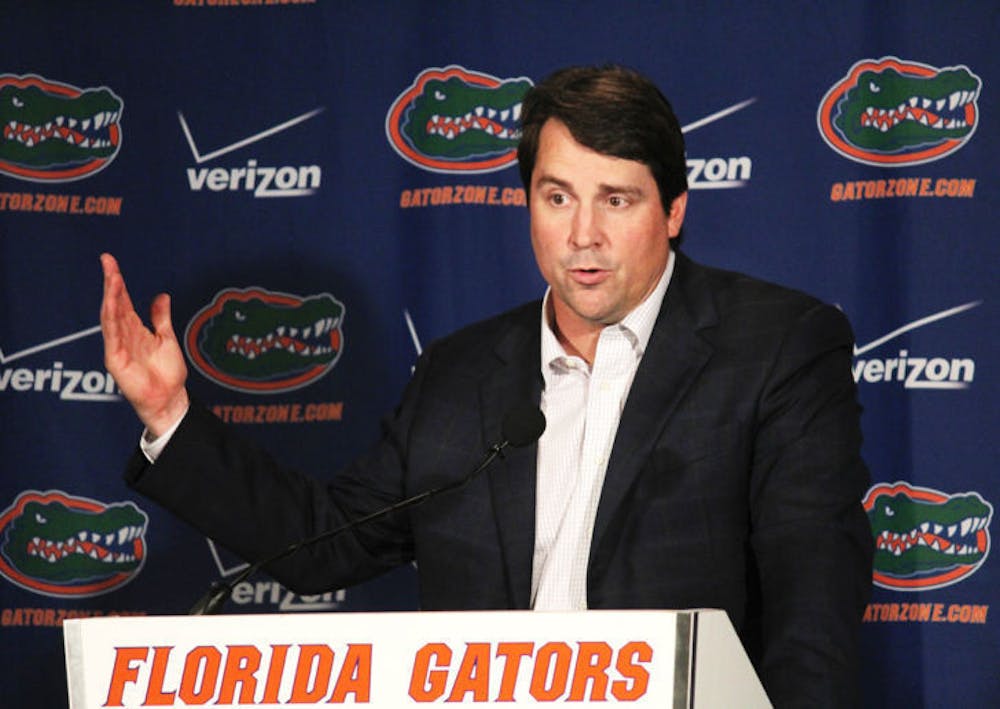<p>Florida coach Will Muschamp speaks with reporters during his National Signing Day press conference on Wednesday at Ben Hill Griffin Stadium.</p>
