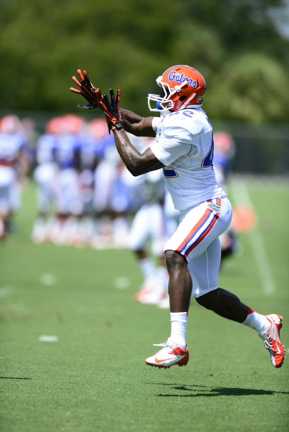 <p align="justify">Freshman Keanu Neal reaches for a pass during practice last Monday. Neal was rated the No. 7 safety in the 2013 recruiting class, according to Rivals.com.</p>