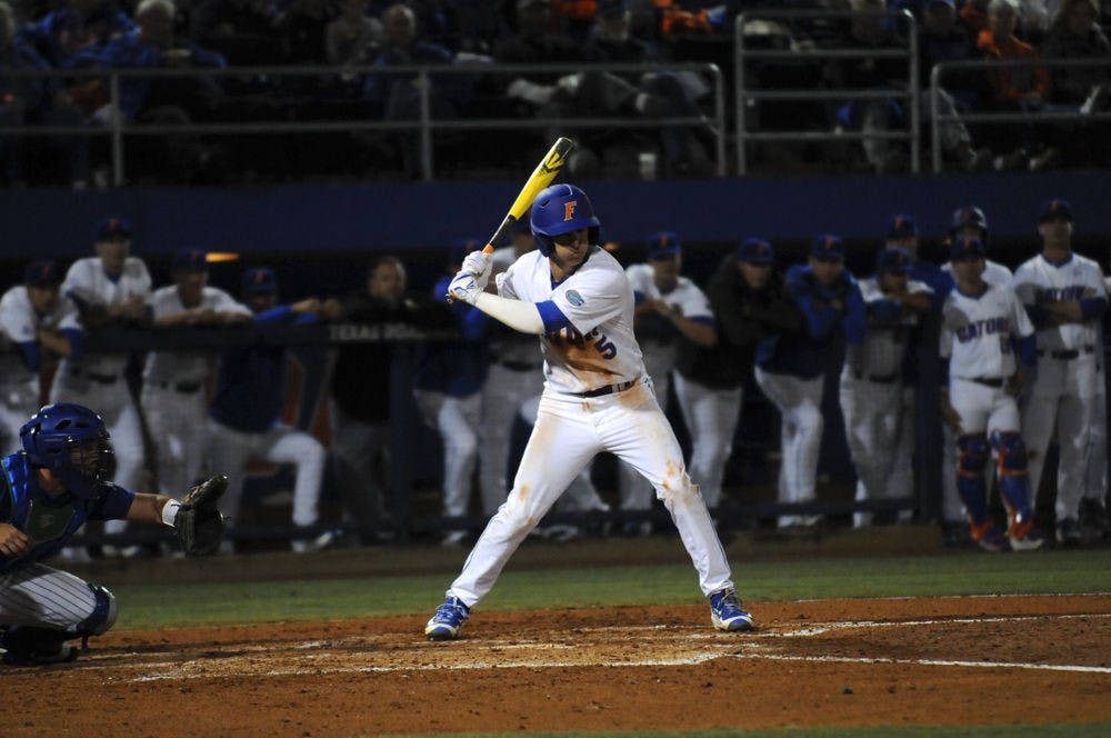 Florida shortstop Dalton Guthrie hits during UF's 4-2 win over Florida Gulf Coast on Feb. 19, 2016, at McKethan Stadium.&nbsp;