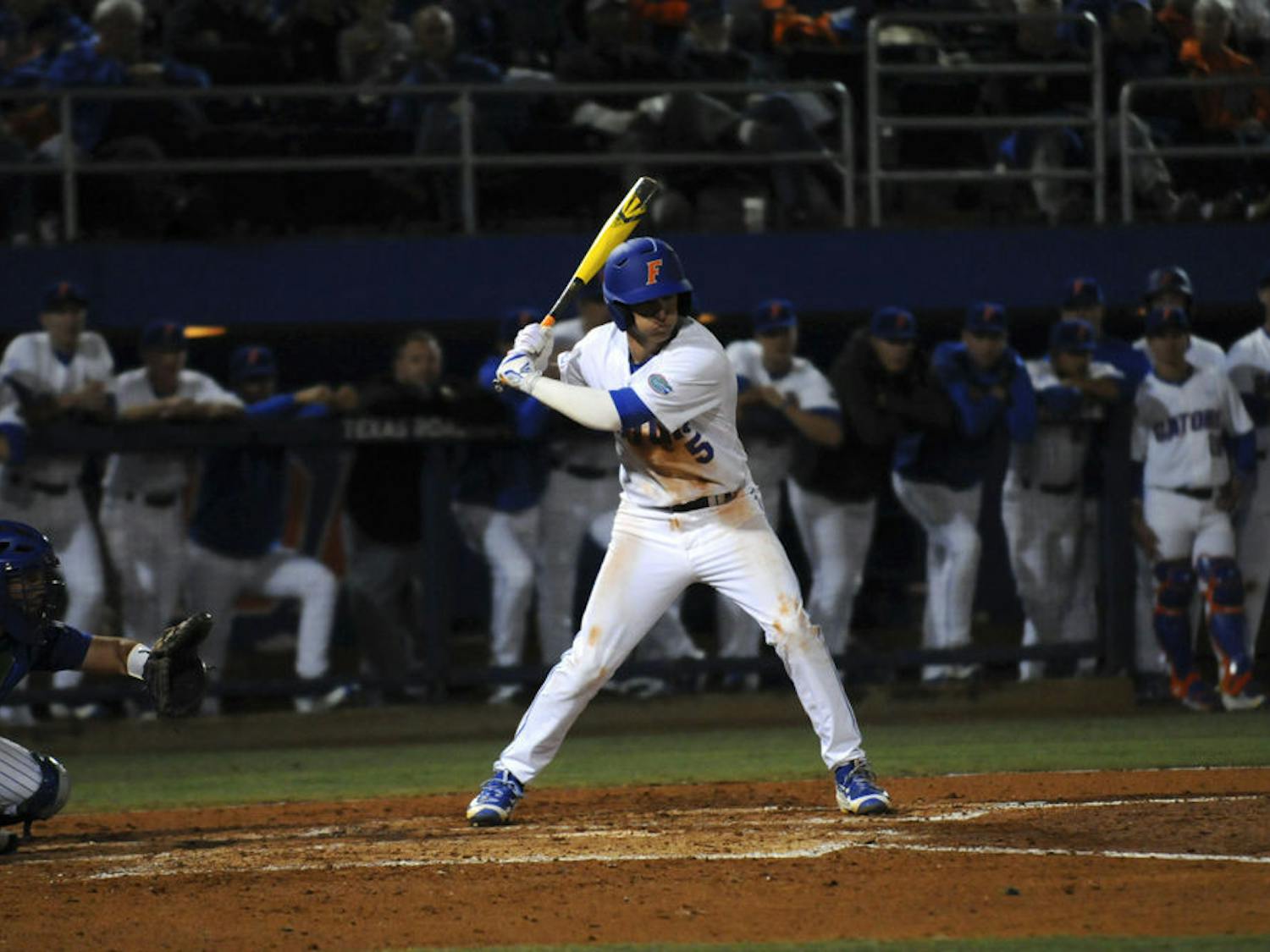 Florida shortstop Dalton Guthrie hits during UF's 4-2 win over Florida Gulf Coast on Feb. 19, 2016, at McKethan Stadium. 
