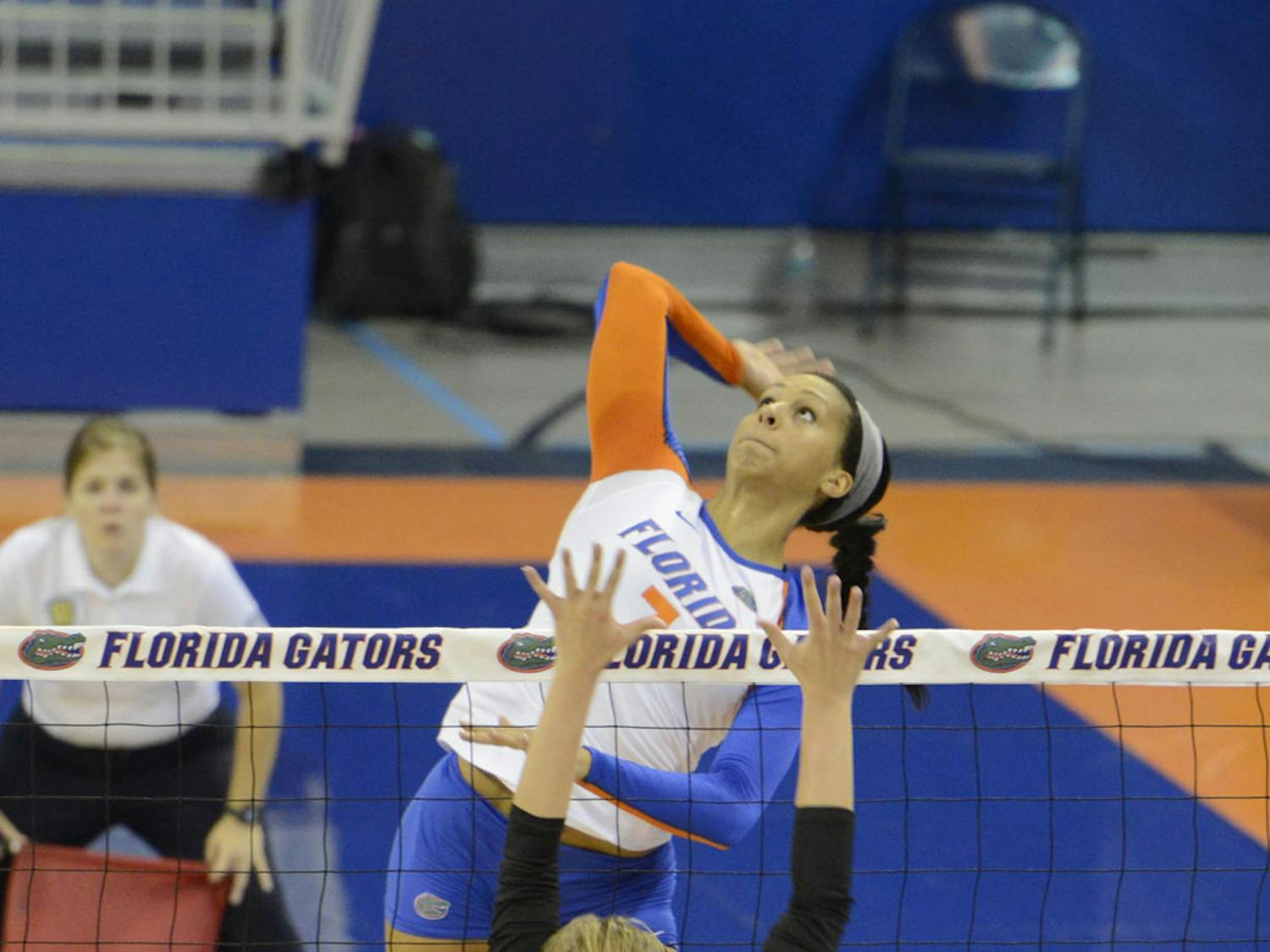 Gabby Mallette reaches to hit the ball during Florida’s four-set win against Western Michigan on Sept. 14 in the O’Connell Center.