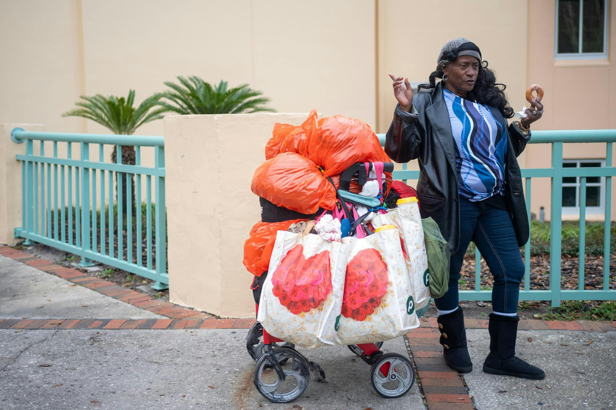 AD Hunter, a Gainesville local, stands outside the Alachua County Main Library downtown, Saturday, Feb. 28, 2026.