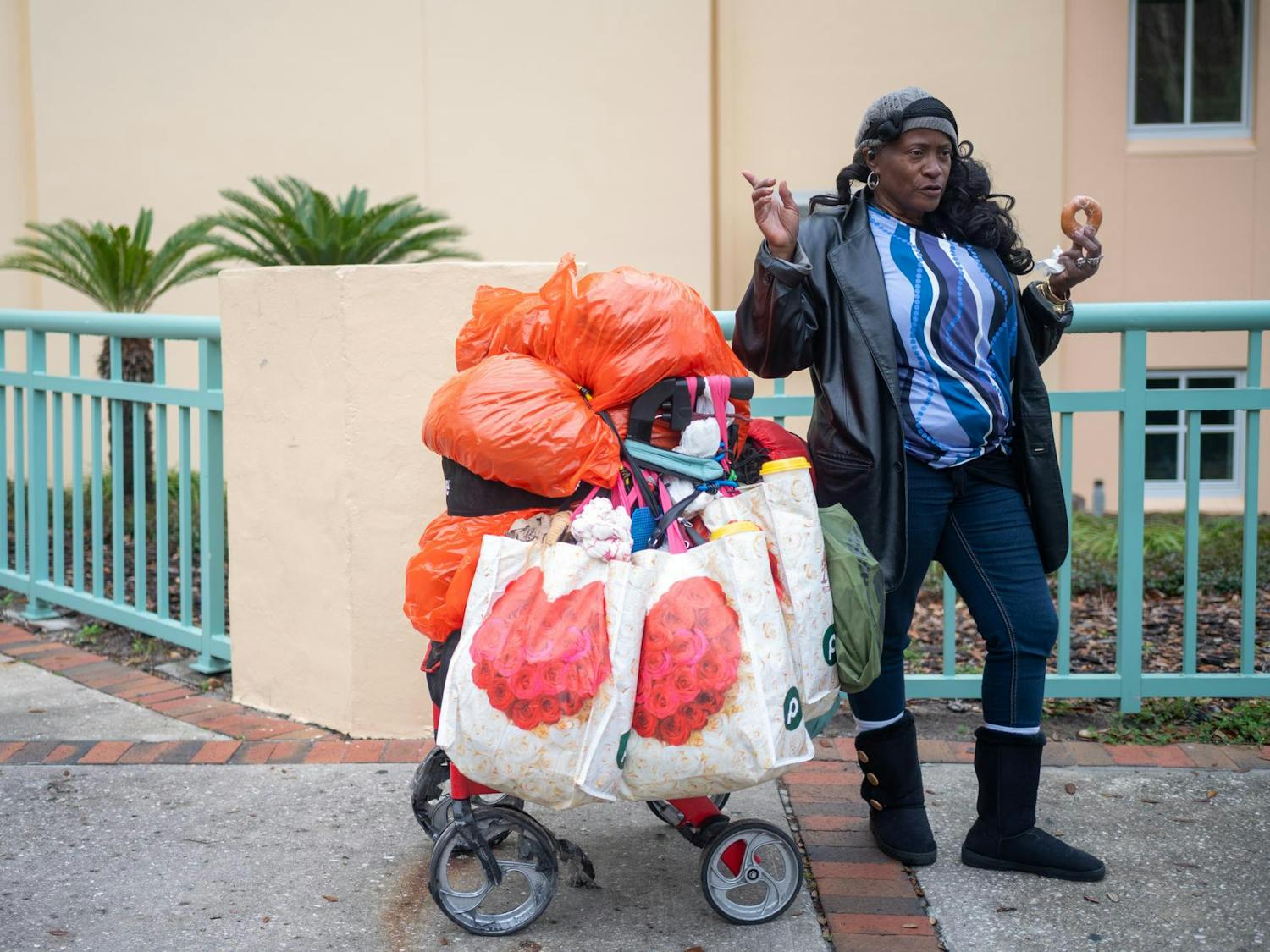 AD Hunter, a Gainesville local, stands outside the Alachua County Main Library downtown, Saturday, Feb. 28, 2026.
