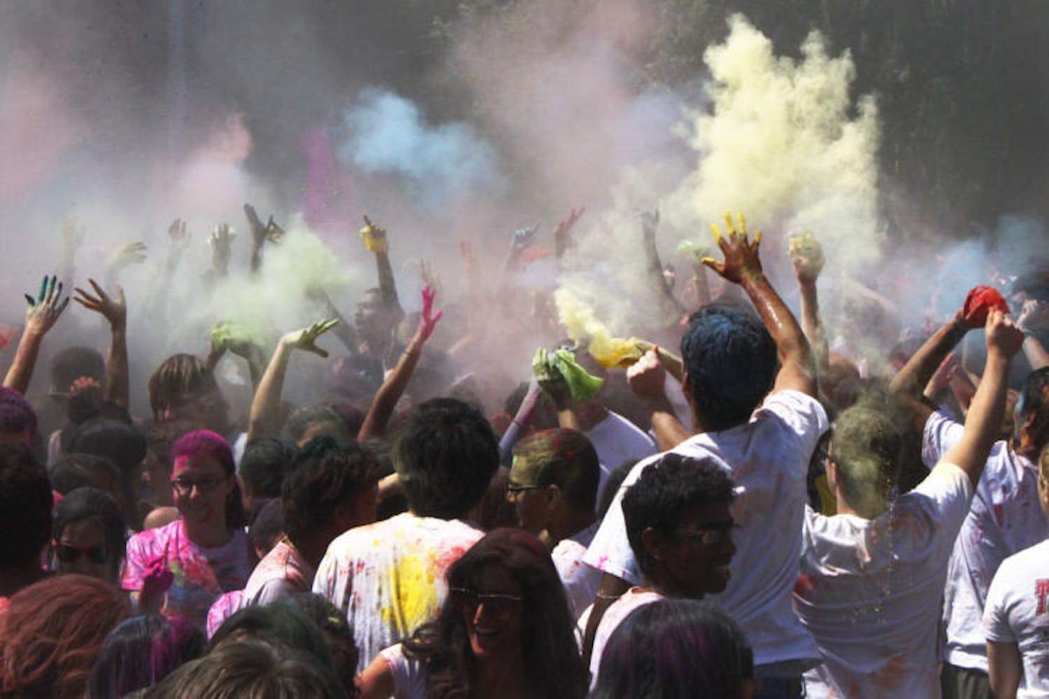 UF students gather on Hume Field on Saturday afternoon to throw colored powder on one another in celebration of the Hindu festival of Holi. The event was organized by the Indian Student Association, Student Government Multicultural Affairs Cabinet and UF Intercultural Engagement.
