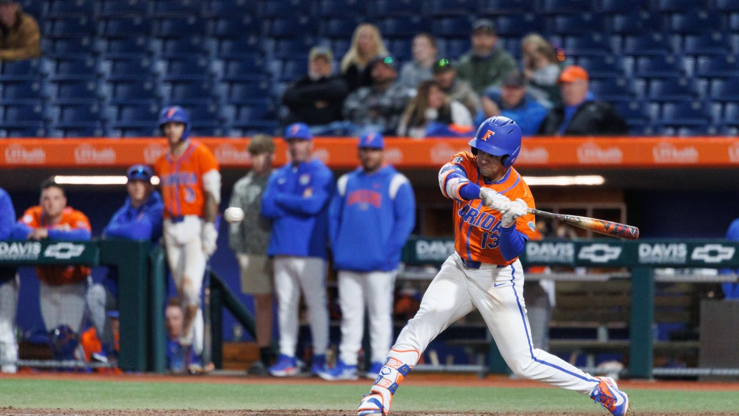 Florida infielder Landon Stripling (13) swings his bat during an NCAA baseball game against Florida International University, Wednesday, Feb. 25, 2026, in Gainesville, Fla.