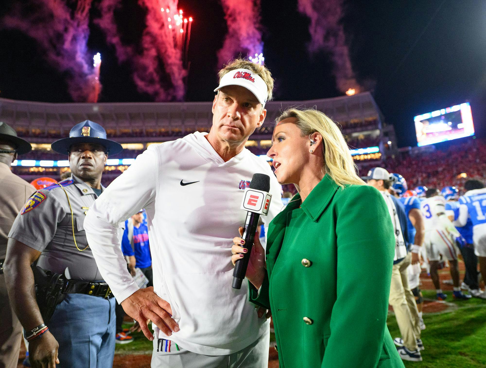 Former Ole Miss head coach Lane Kiffin takes a postgame interview with ESPN’s Kris Budden after an NCAA college football game against Florida, Saturday, Nov. 15, 2025, in Oxford, Miss.