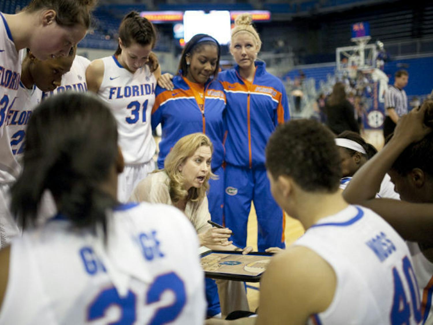 Coach Amanda Butler draws up a play during a timeout in Florida’s 88-81 loss to Ole Miss on Jan. 24 in the O’Connell Center. UF’s loss to Missouri on Thursday was its fifth straight defeat.
