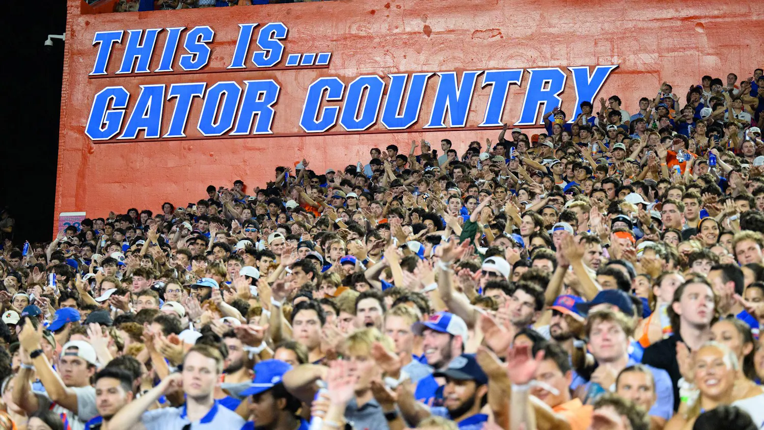 Fans chomp during the first half of an NCAA college football game against FAU, Saturday, Sept. 5, 2026, in Gainesville, Fla.