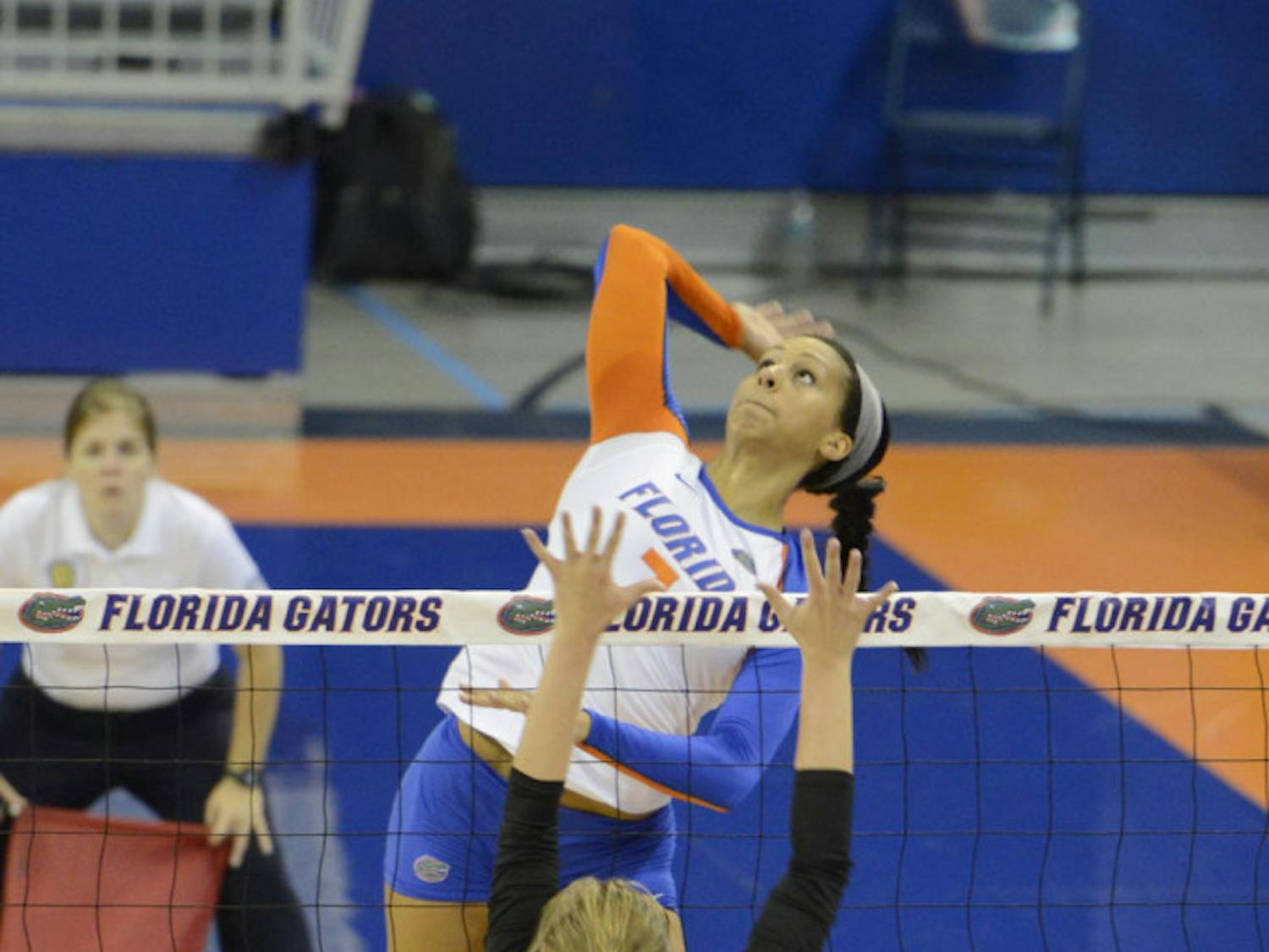 Gabby Mallette reaches to hit the ball during Florida’s four-set win against Western Michigan on Sept. 14 in the O’Connell Center.