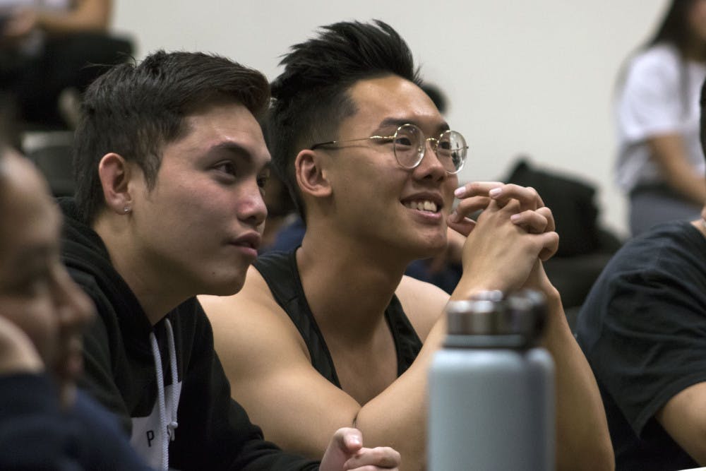 Tuan Nguyen, a 21-year-old biology junior, and Daniel Nguyen, a 22-year-old economics junior, attend a meeting in Little Hall Wednesday evening for the UF Vietnamese Students Organization. Both students said they joined the club their freshman year to form a better connection with their culture and meet new people.