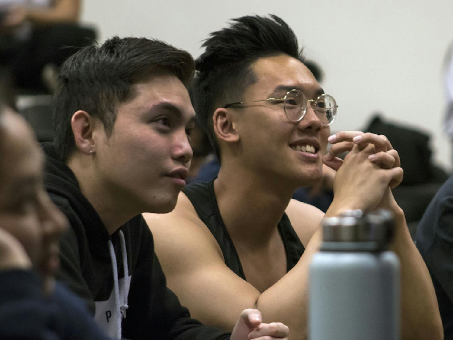 Tuan Nguyen, a 21-year-old biology junior, and Daniel Nguyen, a 22-year-old economics junior, attend a meeting in Little Hall Wednesday evening for the UF Vietnamese Students Organization. Both students said they joined the club their freshman year to form a better connection with their culture and meet new people.