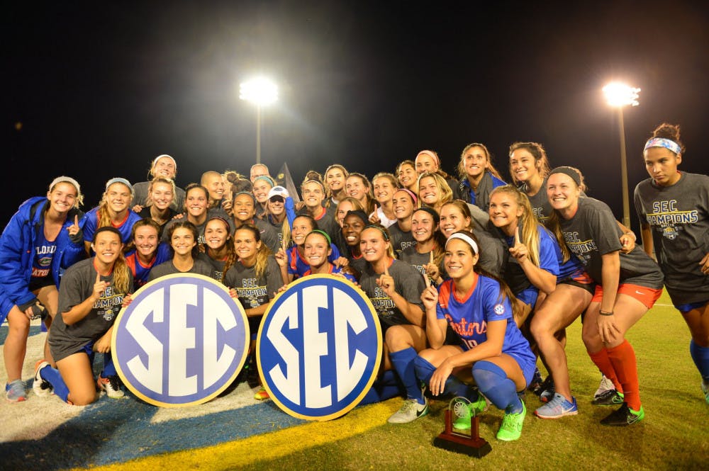 Florida celebrates its 2-1 overtime win in the 2016 Southeastern Conference Tournament championship match in Orange Beach, Alabama.