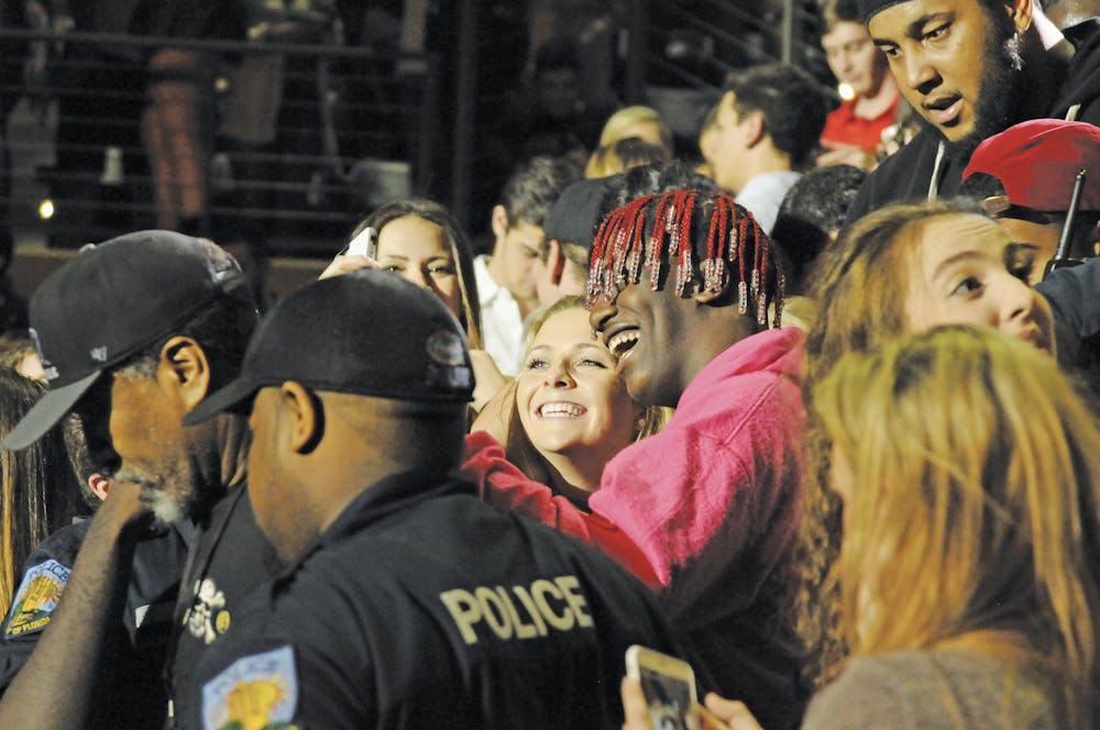 <p dir="ltr"><span>Rapper Lil Yachty takes a selfie with a girl in the crowd of about 6,000. He made an impromptu visit to the crowd during the performance on</span> <span>Wednesday</span><span>, exciting fans before he was escorted backstage by security.</span></p><p><span> </span></p>
