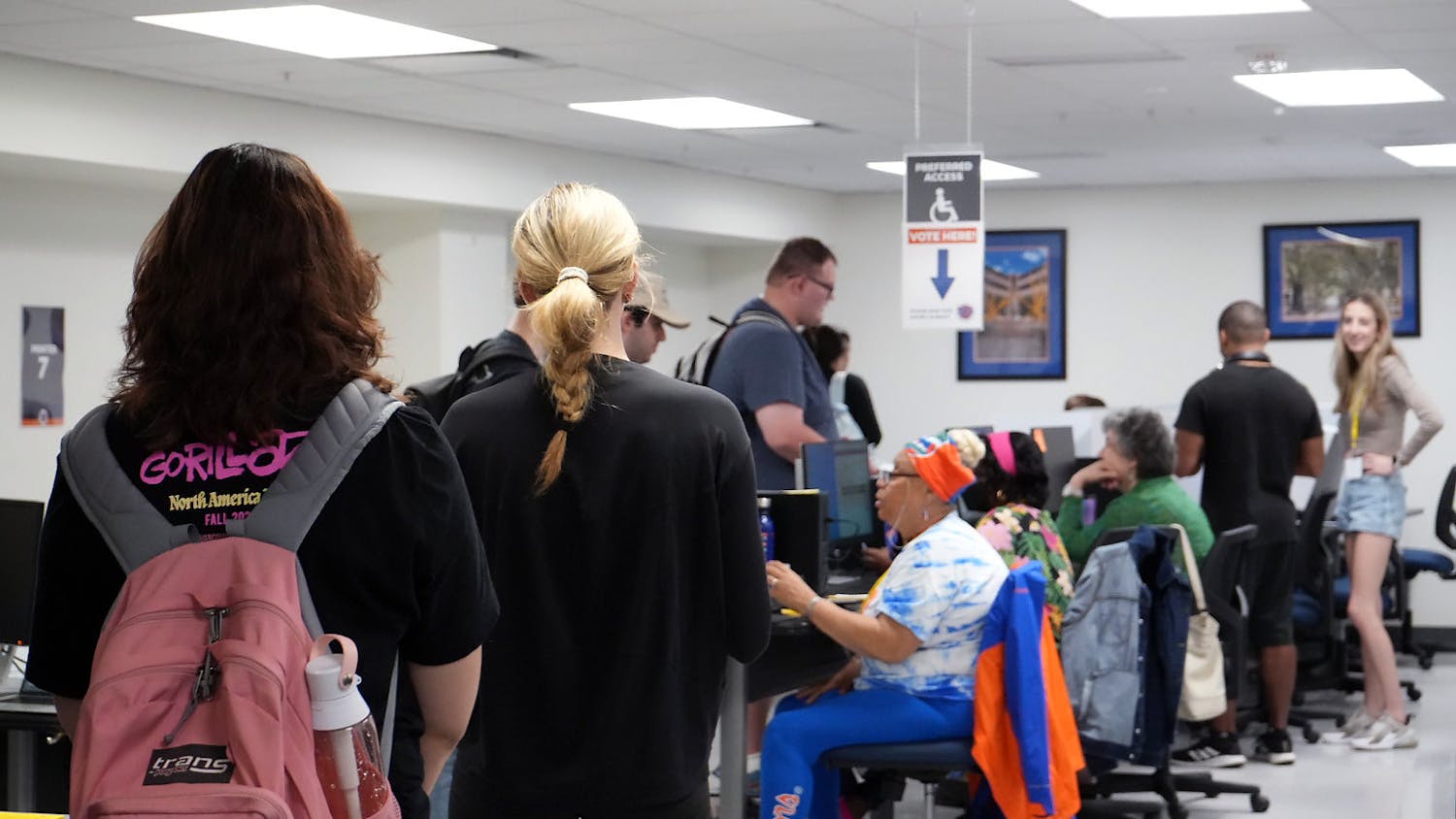 UF students line up at the Reitz Union Printing Lab to cast their ballot for the Spring 2023 student body president, vice president and treasurer Tuesday, Feb. 28, 2023. 