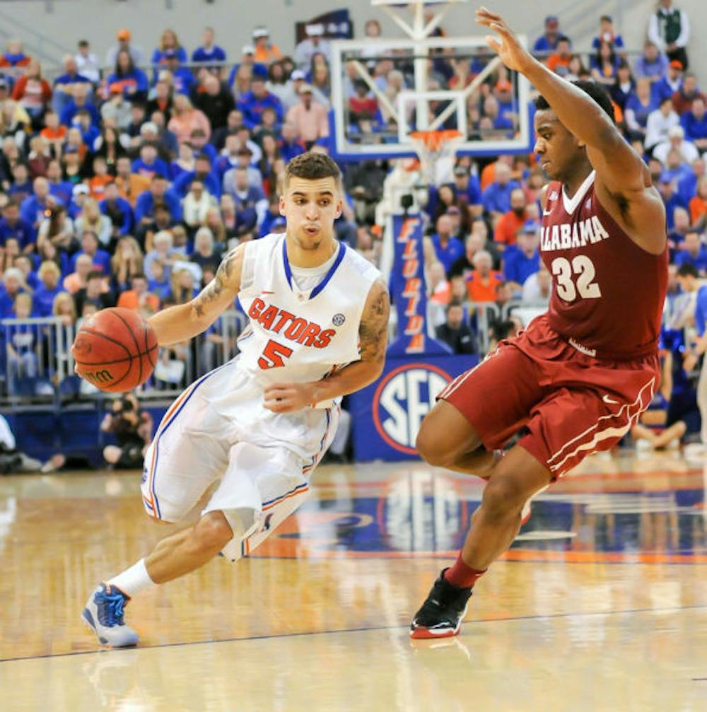 <p>Scottie Wilbekin drives the ball down the court during Florida’s 78-69 win against Alabama on Saturday in the O’Connell Center. Wilbekin and the Florida defense allowed Alabama to shoot 55 percent from the floor.</p>
