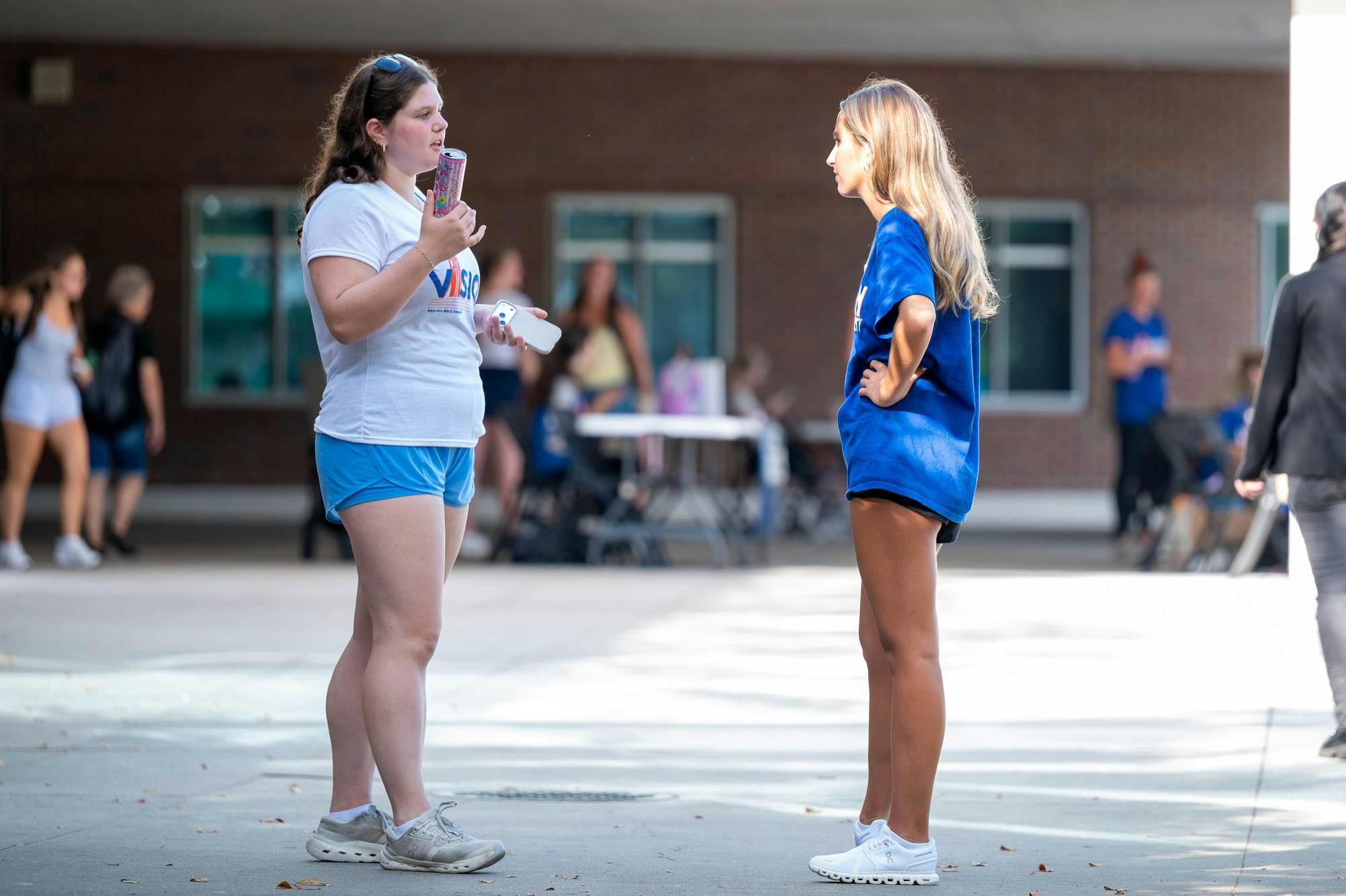 Members of the Vision Party speak to each other outside the Reitz Union, Wednesday, Sept. 30, 2026, in Gainesville, Fla.