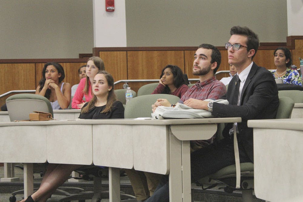 <p>Infinity Hall residents attend the Student Government meeting at the UF Levin College of Law on Sept. 22, 2015, to voice their opinions about wanting their own student senator.</p>