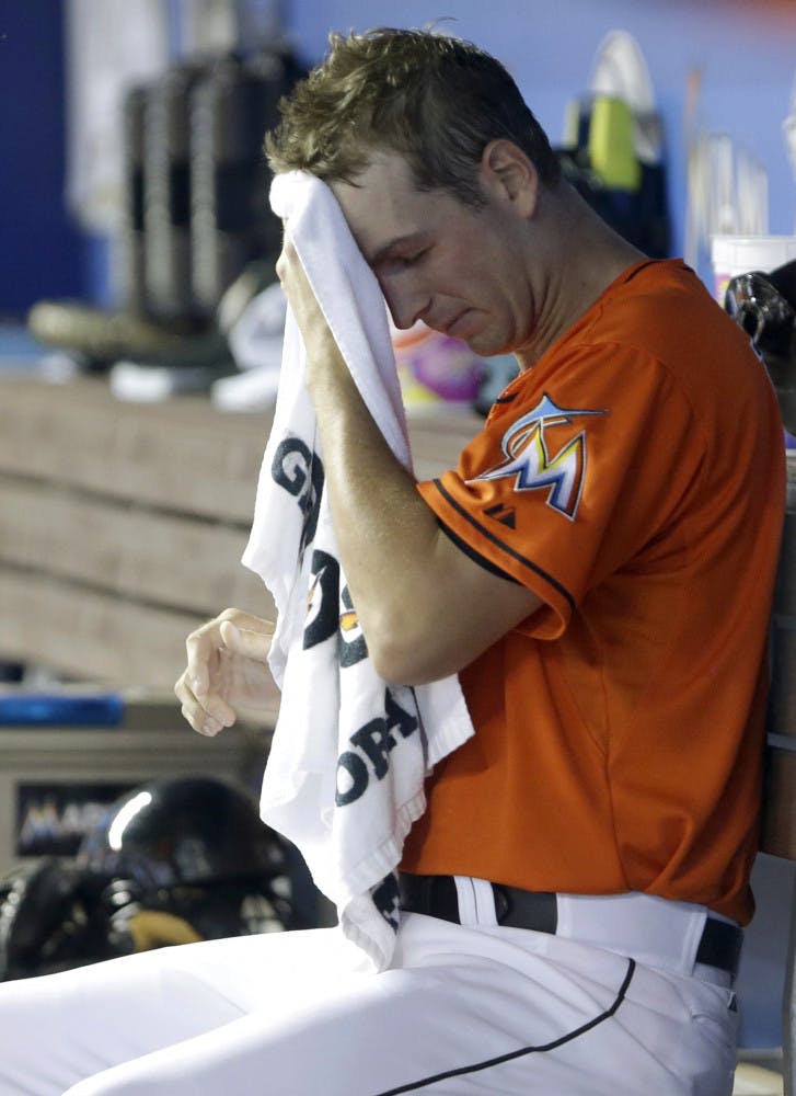 Miami Marlins starting pitcher Jacob Turner wipes his brow during the first inning of a 6-5 loss against the New York Mets on Monday in Miami.